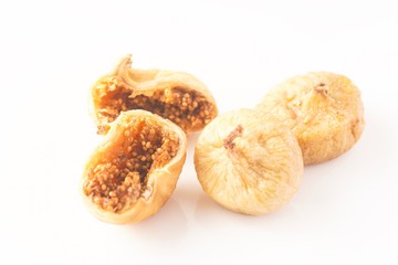 Dried figs isolated against white