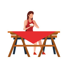 Woman sitting on a picnic table icon, flat design