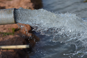 water flow out from pipe by pump supply for dry season