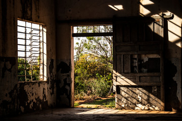 Fototapeta na wymiar Avai, Sao Paulo, Brazil, September 10, 2019. Inside of the old and abandoned train station in Avai municipality, midwest region of Sao Paulo state