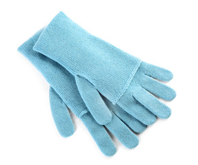 Stylish blue gloves on white background, top view. Autumn clothes