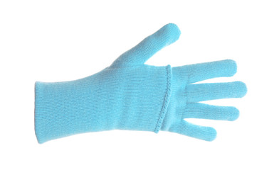 Woman wearing blue glove on white background, closeup. Autumn clothes