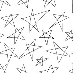 Hand drawn stars. Grunge seamless pattern. Repetetive pattern in black and white. Perfect for wrapping paper, textile, fabric and backdrops.