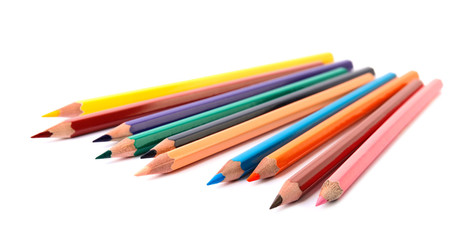 Different color pencils on white background. School stationery