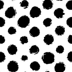 Hand drawn seamless pattern of rough black paint blots, spots or dots. Black and white ink spot texture. Vector illustration perfect for wrapping paper, textile, fabric and backdrops.