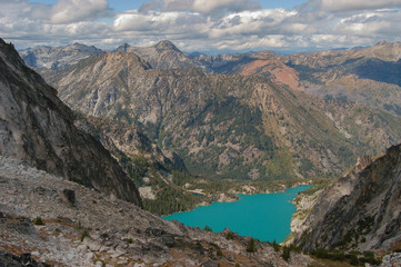 Naklejka na ściany i meble Colchuck Lake viewed from above at Asgaard Pass in the Upper Enchantment Lakes area of the Alpine Lakes, Washington State, WA, USA