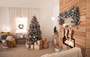 Beautiful Christmas interior of living room with decorated tree