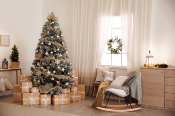 Beautiful interior of living room with decorated Christmas tree