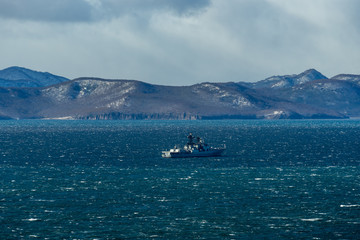 Seascape with a warship in Avacha Bay.