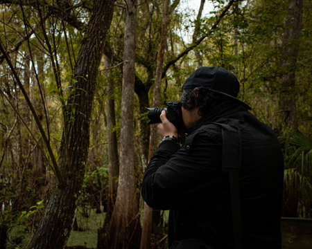 photographer in forest