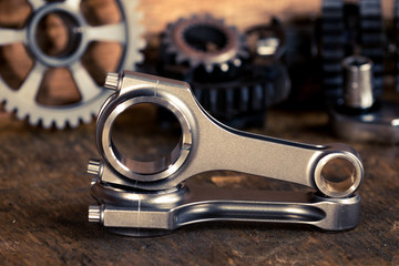 motorcycle engine parts on a workbench with some tools