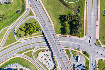 top view of city highway junction. traffic on road with cars. drone photography