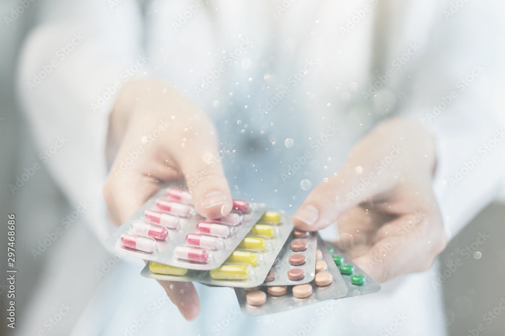 Canvas Prints Pills in female hands, close-up view