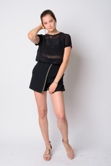 Fototapeta premium Full body shot of young beautiful woman