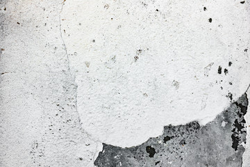 Texture of a concrete wall with cracks and scratches which can be used as a background