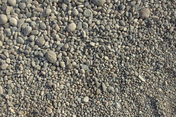 background made of a closeup of a pile of pebbles