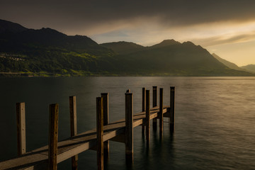 Obraz premium Steg am See beim Sonnenuntergang