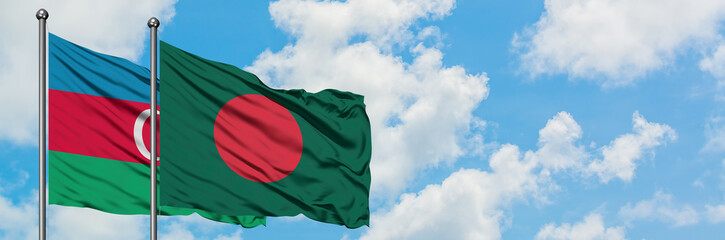 Azerbaijan and Bangladesh flag waving in the wind against white cloudy blue sky together. Diplomacy concept, international relations.