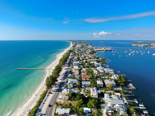 Aerial view of Anna Maria Island town and beaches, barrier island on Florida Gulf Coast. Manatee...