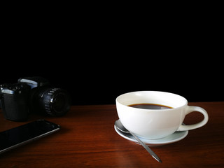 Black Coffee cup drink happiness take a sip espresso  caffeine on wooden table and black background.