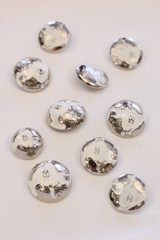Gold and silver buttons