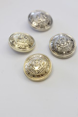Gold and silver buttons