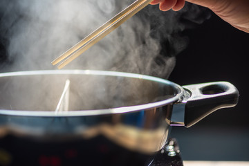 Shabu-shabu is a Japanese nabemono hotpot dish of thinly sliced meat and vegetables boiled in water. The term is onomatopoeic, derived from the sound emitted when the ingredients are stirred.