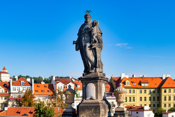 Fototapeta na wymiar Statue of Saint Anthony of Padua, by Jan Oldřich Mayer On the Carlo Bridge in Prague