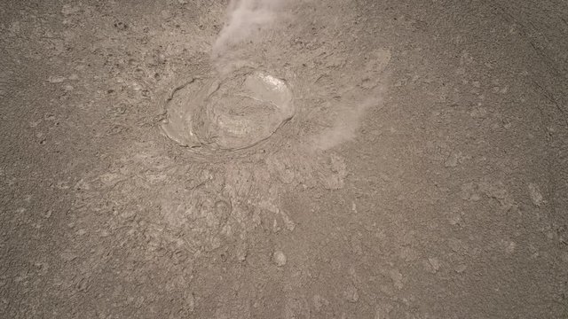 Mud volcano bledug kuwu. aerial view volcanic plateau with geothermal activity and geysers, Indonesia java. aerial view volcanic landscape