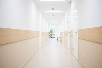 long corridors to hospitals, offices in the hospital. concept of pandemic, coronavirus, virus, disinfection, panic.