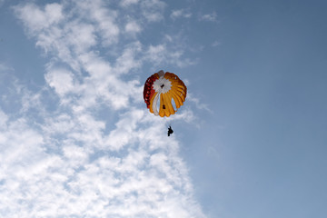 A paratrooper is landing.