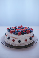 pancake cake with raspberries blueberries red currants