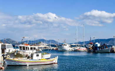 Fototapeta premium Fishing boats at small harbour in Pachi village. Megara,Greece
