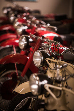 Row of parked vintage motorcycles