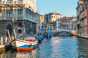 Fototapeta na wymiar Boats are moored in the canal, Venice, Italy.