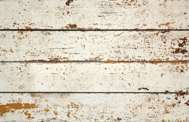 Background of old wooden weathered slat with peeling paint