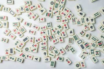 Pile of Mahjong ancient asian game on the white background 