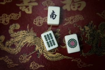 Pile of Mahjong ancient asian game on the wooden box