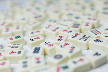 Pile of Mahjong ancient asian game on the white background 