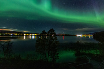 Naklejka na ściany i meble autumnal northern lights in Lapland, Finland
