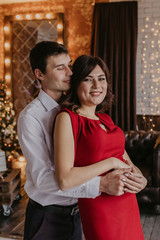 Happy couple celebrating Christmas together .