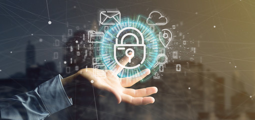 Businessman holding a Security padlock wheel icon with multimedia and social media icon 3d rendering