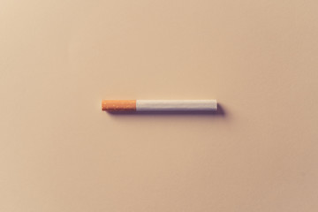 Conceptual image of cigarette isolated. Stop smoking advertising campaign