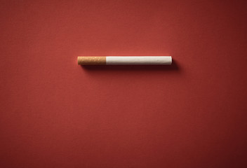 Conceptual image of cigarette in stop smoking advertising campaign