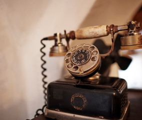 Retro Phone - vintage telephone on wooden table