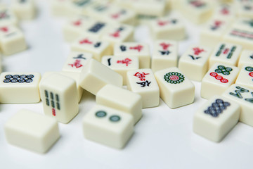 Pile of Mahjong ancient asian game on the white background 