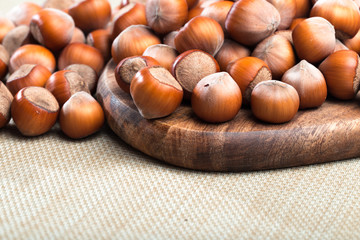 close up of hazelnuts on table .