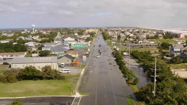 Aerial view of flooded city Avon, flying above town 4k