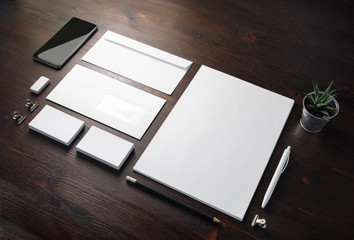 Photo of blank stationery set on wood table background. Corporate identity template. Responsive...