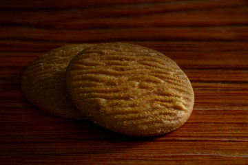 cookies on dark old wooden table with place for text., freshly baked. Selective Focus with Copy space.